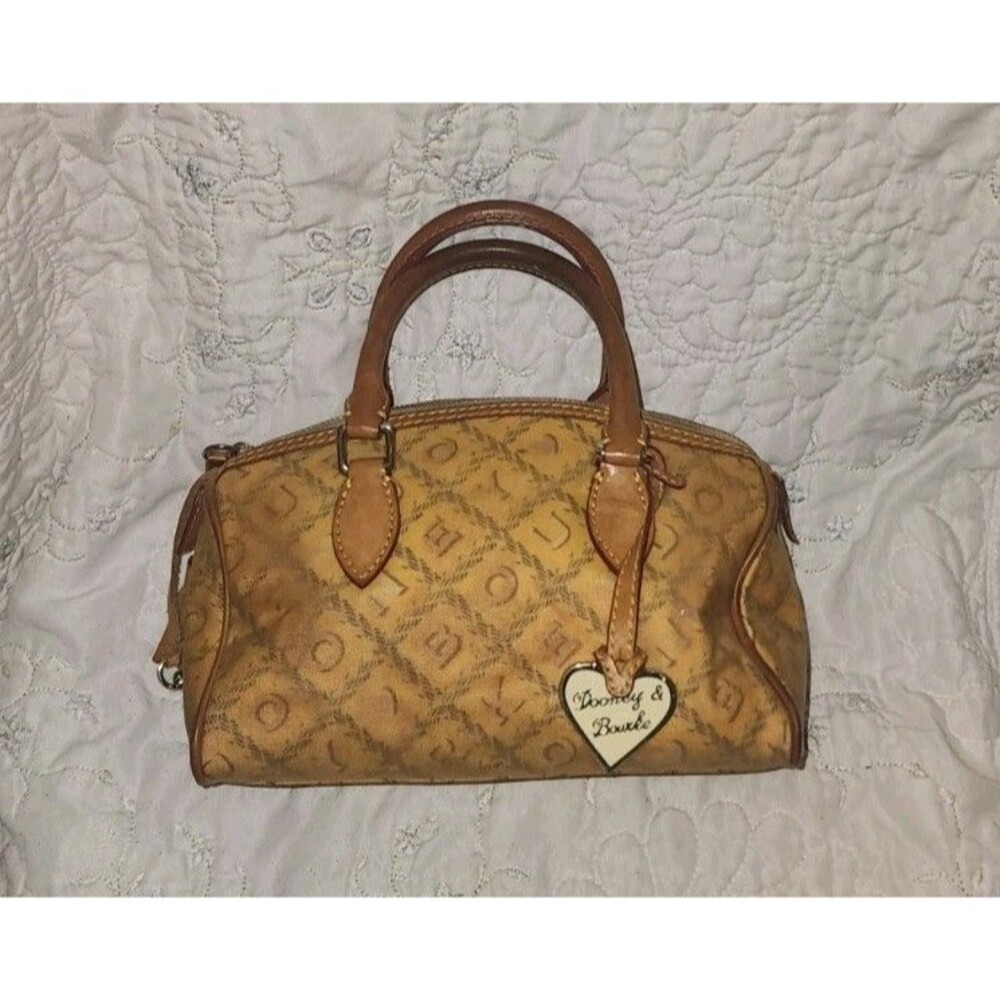 Dooney and Bourke Small Dome Canvas and Leather Signature Ivory Lara Handbag